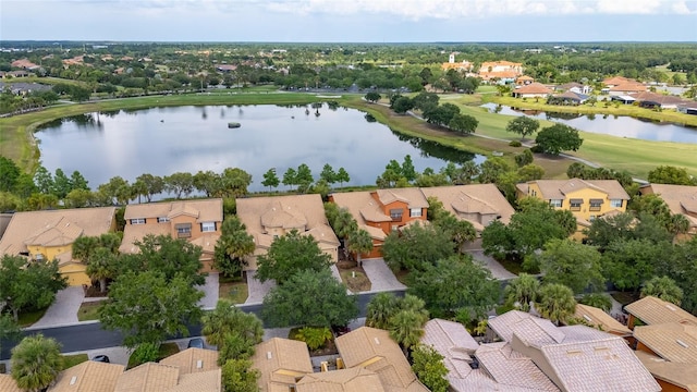 2376 Palm Tree Dr, Kissimmee, FL 34759 - aerial view of residential area with a nearby body of water and a local golf course