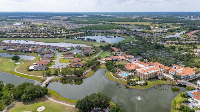 2376 Palm Tree Dr, Kissimmee, FL 34759 - aerial view of property's location with a nearby body of water, a golf course, and nearby suburban area