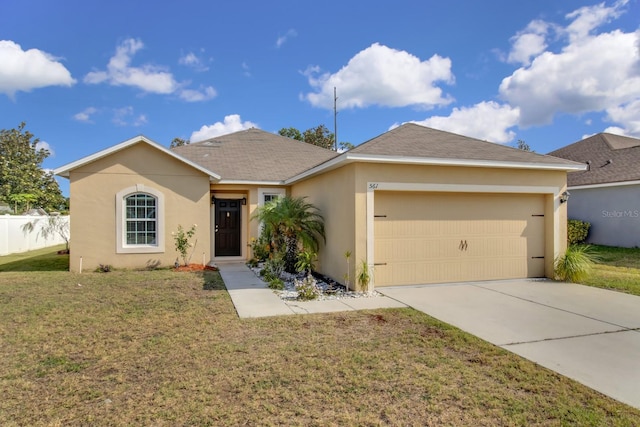 561 Lake Cummings Way, Lake Alfred, FL 33850 - single story home with an attached garage, stucco siding, and driveway