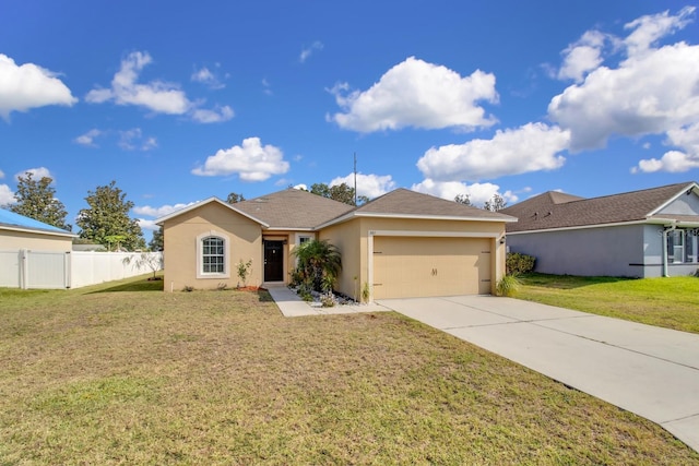 561 Lake Cummings Way, Lake Alfred, FL 33850 - ranch-style house featuring a garage, stucco siding, and concrete driveway