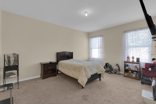 561 Lake Cummings Way, Lake Alfred, FL 33850 - carpeted bedroom featuring baseboards