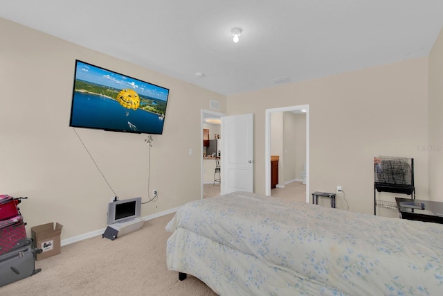 561 Lake Cummings Way, Lake Alfred, FL 33850 - bedroom featuring baseboards and light carpet