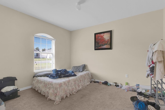 561 Lake Cummings Way, Lake Alfred, FL 33850 - bedroom with carpet flooring and baseboards