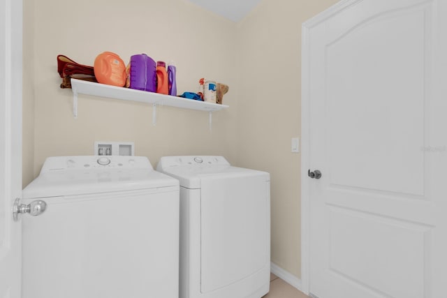 561 Lake Cummings Way, Lake Alfred, FL 33850 - laundry area with washer and clothes dryer