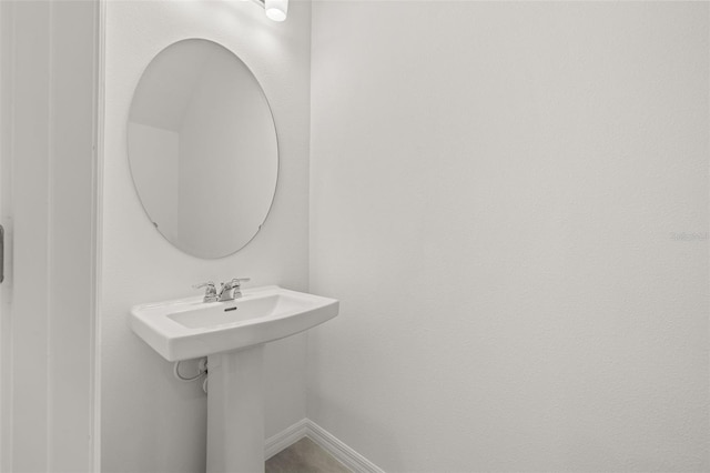 bathroom featuring baseboards