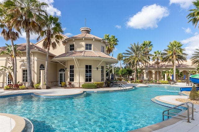 community pool featuring a patio