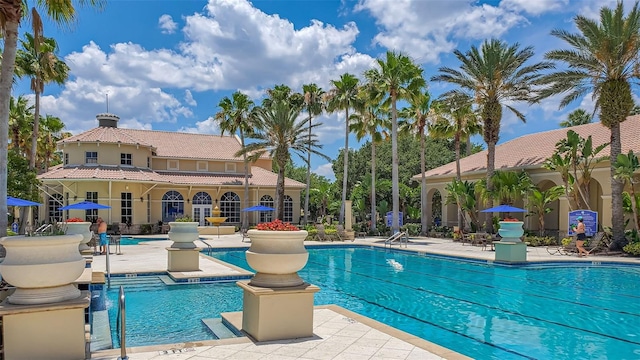 community pool featuring a patio