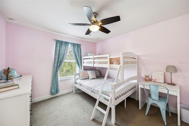 bedroom with light carpet, baseboards, and ceiling fan