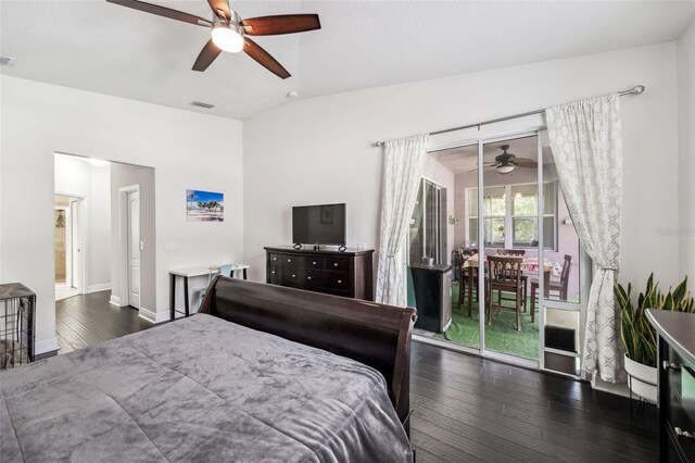 bedroom with access to exterior, dark wood finished floors, baseboards, and a ceiling fan