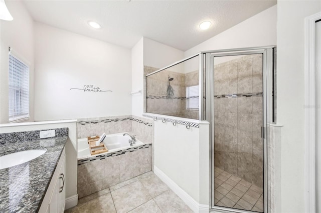 bathroom with a shower stall, a bath, tile patterned floors, vanity, and recessed lighting