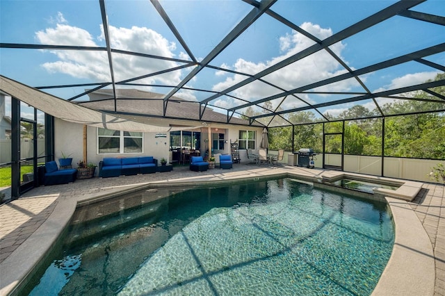 view of pool with an outdoor hangout area, a patio, a pool with connected hot tub, area for grilling, and glass enclosure