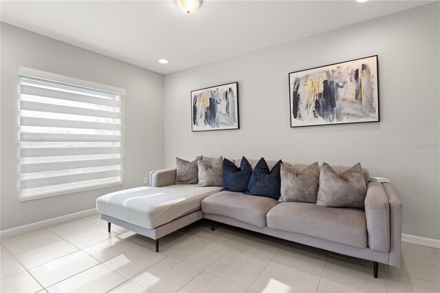 352 Smugglers Way, Apopka, FL 32712 - living area featuring baseboards, light tile patterned floors, and recessed lighting