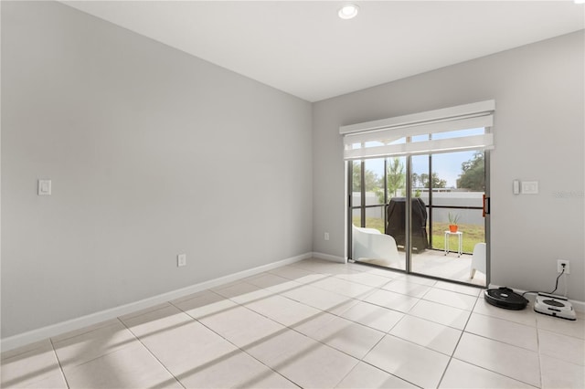 352 Smugglers Way, Apopka, FL 32712 - empty room with baseboards, recessed lighting, and light tile patterned flooring