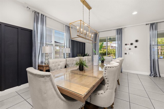 420 Burma St, Kissimmee, FL 34747 - dining room with a chandelier and light tile patterned flooring