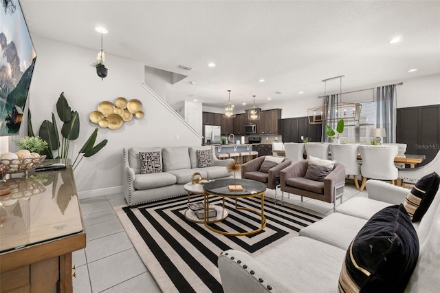 420 Burma St, Kissimmee, FL 34747 - living area featuring light tile patterned floors and recessed lighting