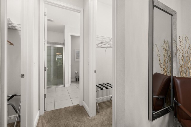420 Burma St, Kissimmee, FL 34747 - hall featuring tile patterned flooring and carpet floors