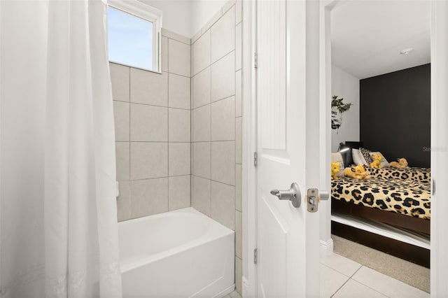 420 Burma St, Kissimmee, FL 34747 - bathroom featuring tile patterned floors and shower / bath combination with curtain