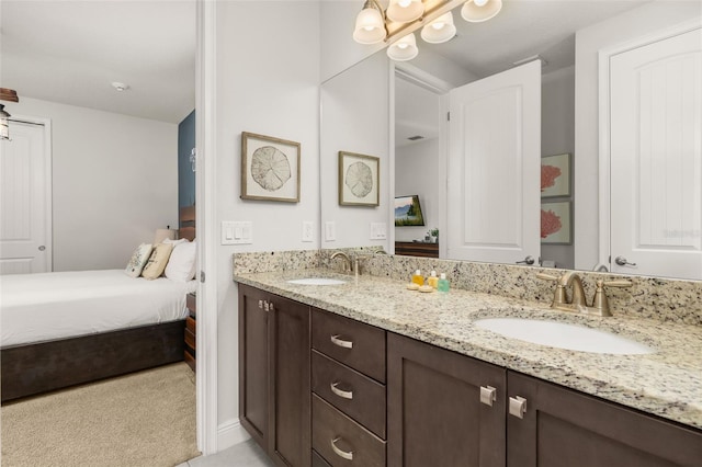 420 Burma St, Kissimmee, FL 34747 - ensuite bathroom featuring double vanity and a chandelier