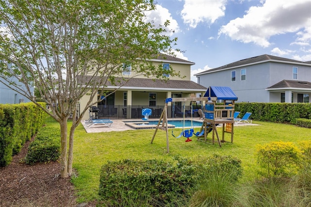 420 Burma St, Kissimmee, FL 34747 - rear view of property with a patio area