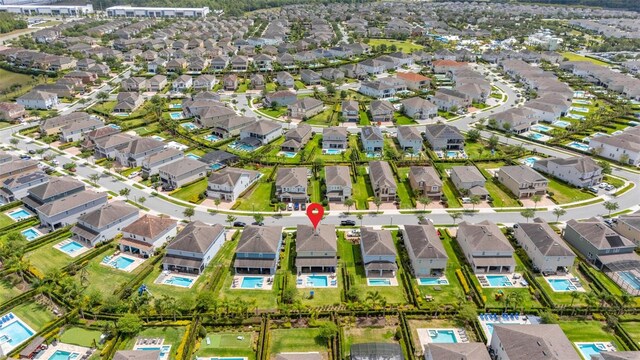 420 Burma St, Kissimmee, FL 34747 - aerial view of property and surrounding area featuring nearby suburban area