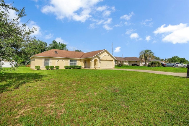 14091 SW 32nd Terrace Rd, Ocala, FL 34473 - single story home featuring driveway, an attached garage, a front yard, and stucco siding