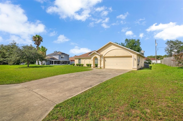 14091 SW 32nd Terrace Rd, Ocala, FL 34473 - view of front of house with concrete driveway, an attached garage, and stucco siding
