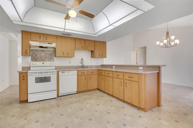 14091 SW 32nd Terrace Rd, Ocala, FL 34473 - kitchen featuring white appliances, under cabinet range hood, a ceiling fan, light countertops, and a peninsula