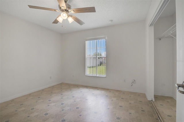 14091 SW 32nd Terrace Rd, Ocala, FL 34473 - unfurnished bedroom with a textured ceiling and ceiling fan