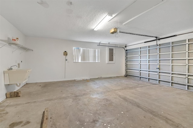 14091 SW 32nd Terrace Rd, Ocala, FL 34473 - garage featuring electric panel and a garage door opener