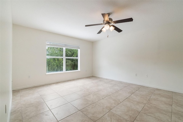4630 Elena Way, Melbourne, FL 32934 - empty room featuring a ceiling fan and light tile patterned floors