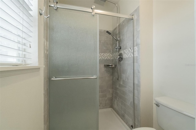4630 Elena Way, Melbourne, FL 32934 - bathroom with a stall shower and toilet