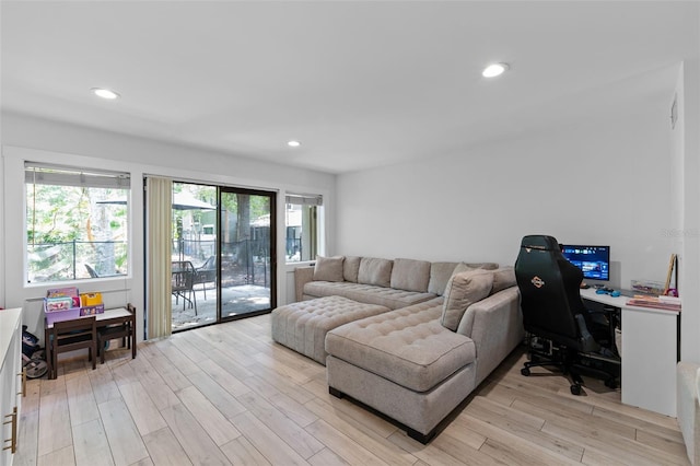 5234 Eaglesmere Dr Unit D04, Orlando, FL 32819 - living room featuring light wood finished floors, an office area, and recessed lighting