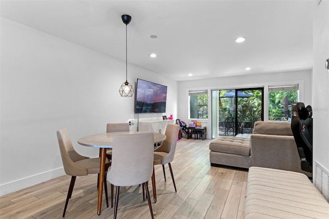 5234 Eaglesmere Dr Unit D04, Orlando, FL 32819 - dining space featuring light wood-style flooring, recessed lighting, and baseboards