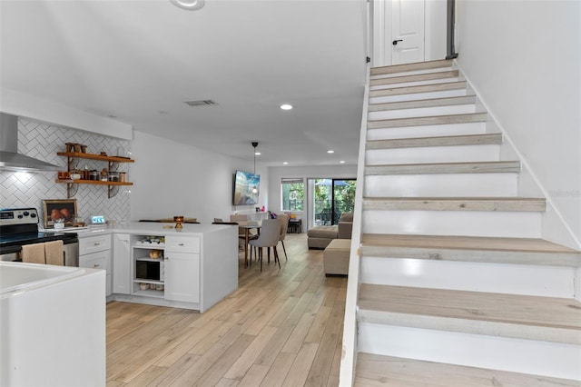 5234 Eaglesmere Dr Unit D04, Orlando, FL 32819 - stairs featuring wood finished floors and recessed lighting