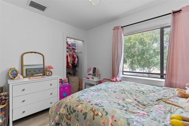 5234 Eaglesmere Dr Unit D04, Orlando, FL 32819 - bedroom featuring light wood-style floors and a closet