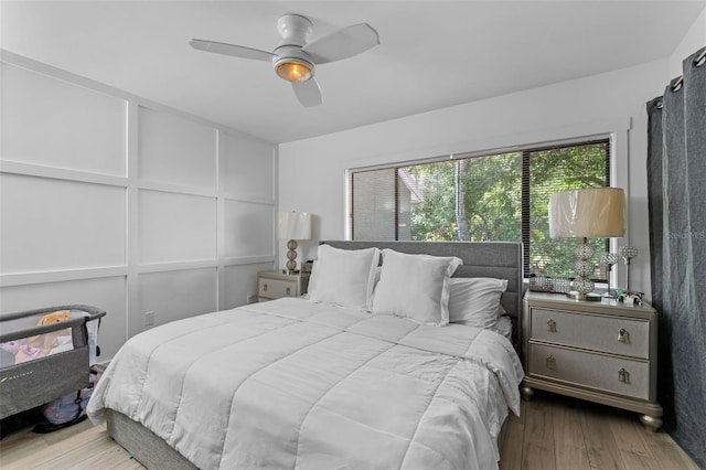 5234 Eaglesmere Dr Unit D04, Orlando, FL 32819 - bedroom with wood finished floors and a ceiling fan