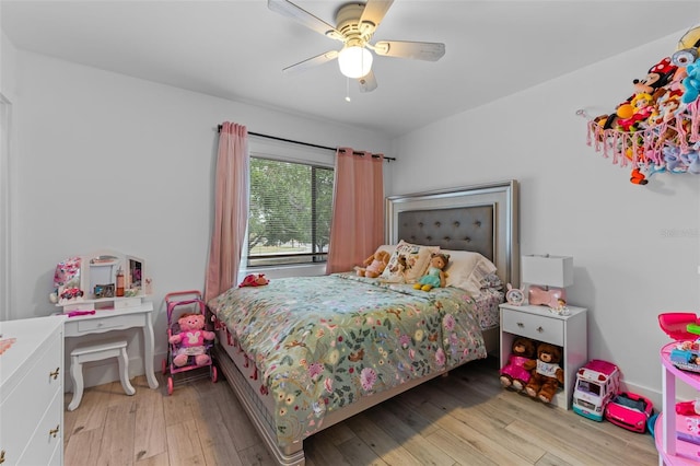 5234 Eaglesmere Dr Unit D04, Orlando, FL 32819 - bedroom featuring light wood-type flooring and a ceiling fan
