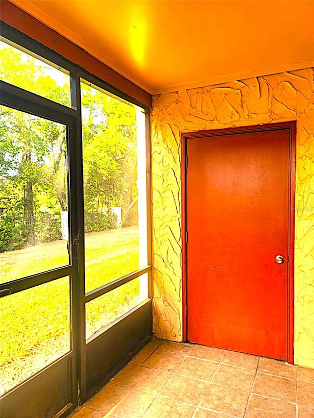 2864 N Powers Dr Unit 150, Orlando, FL 32818 - unfurnished sunroom with plenty of natural light
