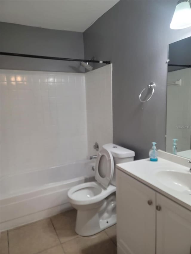 2864 N Powers Dr Unit 150, Orlando, FL 32818 - bathroom with tub / shower combination, tile patterned flooring, toilet, and vanity