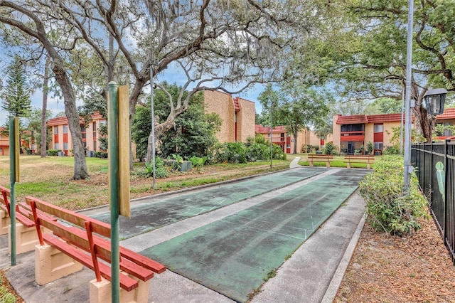 2864 N Powers Dr Unit 150, Orlando, FL 32818 - surrounding community with shuffleboard and fence