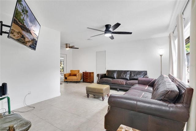 5234 Ohio St, Winter Park, FL 32792 - living room featuring healthy amount of natural light, a ceiling fan, and tile patterned floors