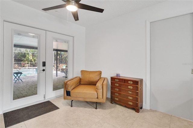 5234 Ohio St, Winter Park, FL 32792 - living area featuring french doors, a ceiling fan, and light tile patterned floors