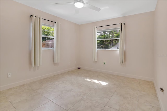 5234 Ohio St, Winter Park, FL 32792 - tiled spare room featuring a ceiling fan and baseboards