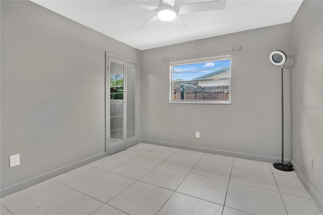 5234 Ohio St, Winter Park, FL 32792 - unfurnished room with baseboards, a ceiling fan, and tile patterned floors
