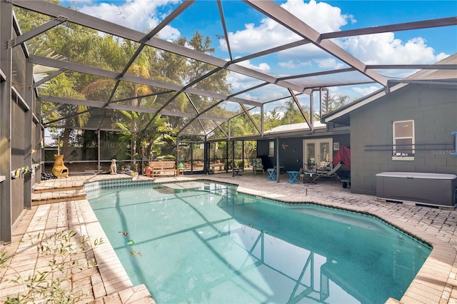 5234 Ohio St, Winter Park, FL 32792 - outdoor pool with french doors, a patio, a lanai, and a hot tub