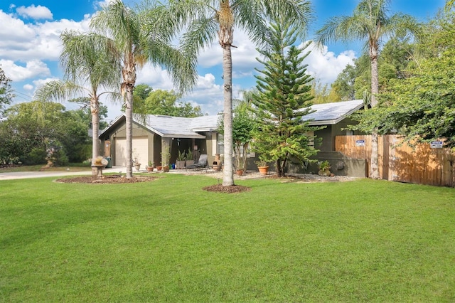 5234 Ohio St, Winter Park, FL 32792 - view of front facade with an attached garage and driveway