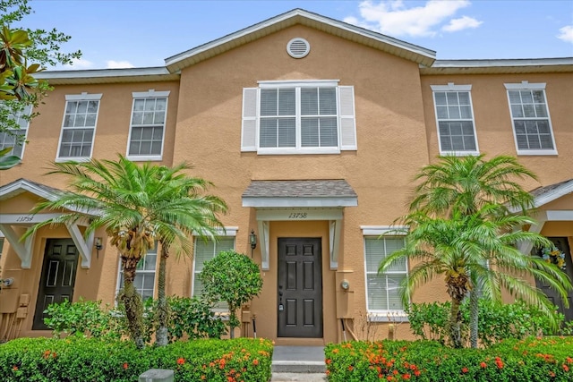 13758 Daniels Landing Cir, Winter Garden, FL 34787 - townhome / multi-family property with stucco siding