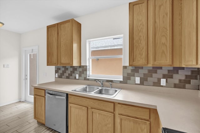 13758 Daniels Landing Cir, Winter Garden, FL 34787 - kitchen featuring stainless steel dishwasher, a sink, decorative backsplash, light countertops, and light brown cabinetry