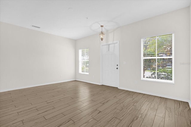 13758 Daniels Landing Cir, Winter Garden, FL 34787 - empty room featuring wood finished floors and baseboards