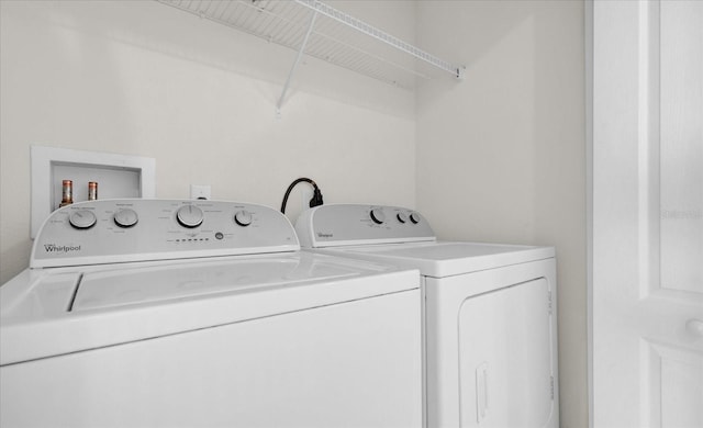 13758 Daniels Landing Cir, Winter Garden, FL 34787 - laundry area featuring separate washer and dryer